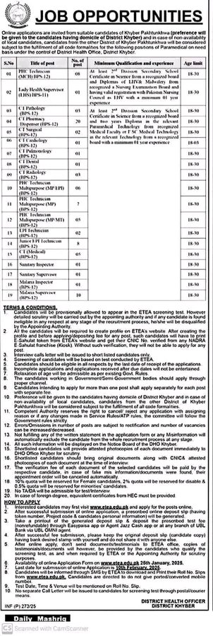 Candidates filling out the District Health Officer Khyber application form